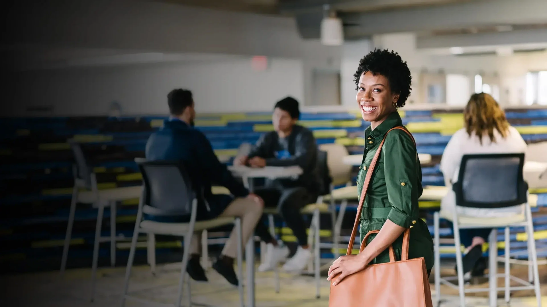 Smiling Adult Student Entering Classroom