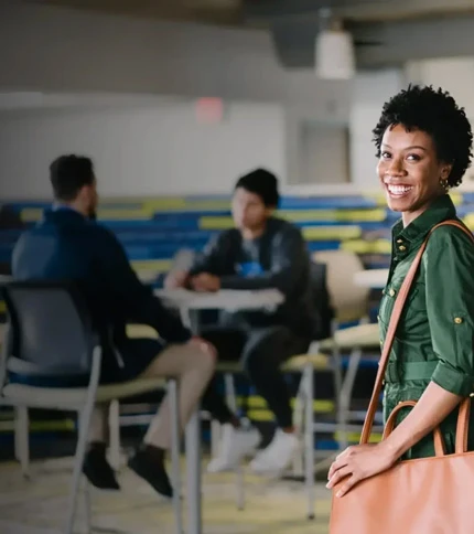 A Smiling Adult Student Entering Classroom